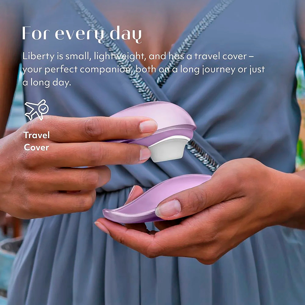 Бесконтактный вакуумный стимулятор клитора Womanizer Liberty сиреневый